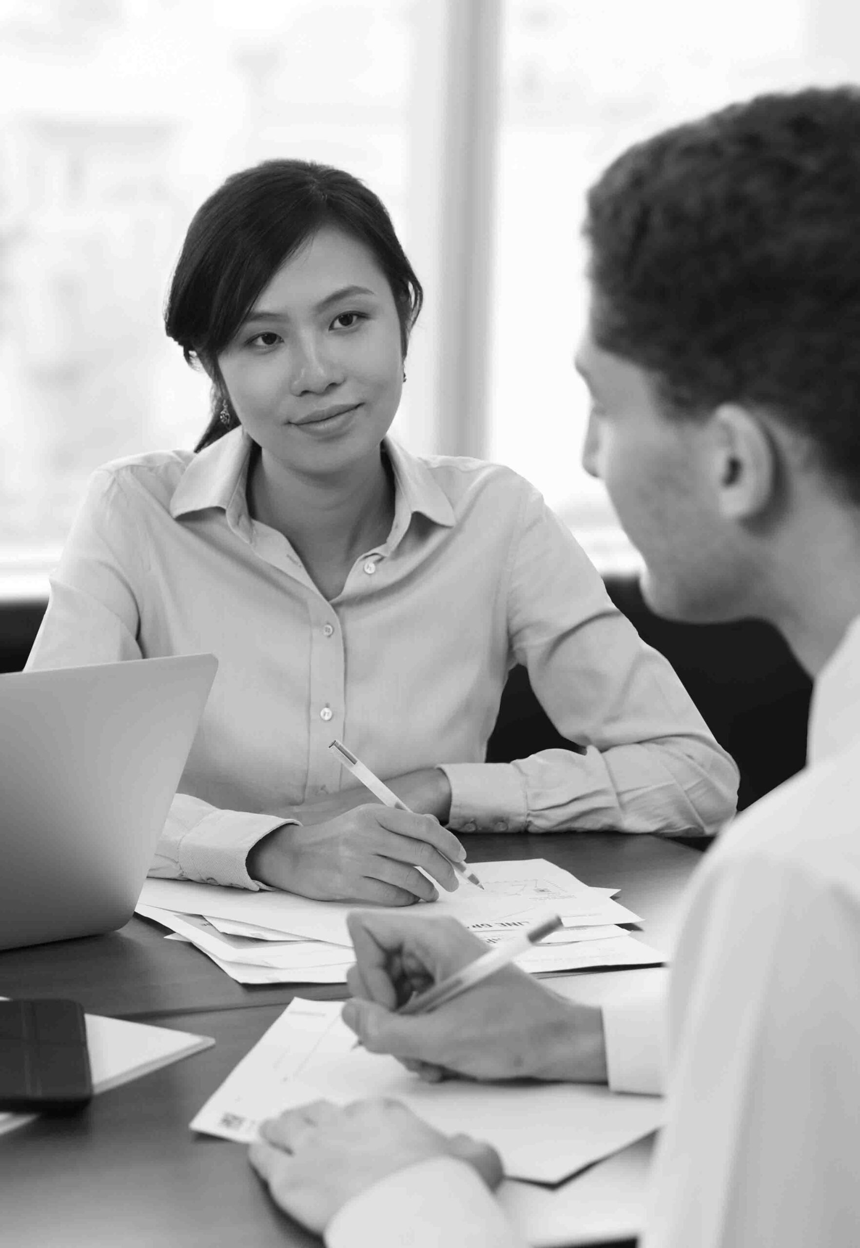 An employee applying for an Employment Pass in Singapore